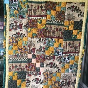 - Handmade Lap Quilt.   40” x 48”